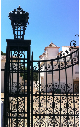 Gate for castle, baroque wrought iron gates with two doors two columns with lanterns top