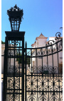 Gate for castle, baroque wrought iron gates with two doors two columns with lanterns top