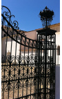 Gate for castle, baroque wrought iron gates with two doors two columns with lanterns top