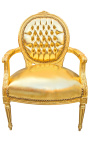 Baroque armchair Louis XVI style medallion in false gold skin leather and gold wood.