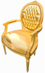 Baroque armchair Louis XVI style medallion in false gold skin leather and gold wood.