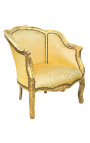 Iso bergere-nojatuoli Louis XV tyyliin kultaisella satiinikankaalla ja kultapuulla