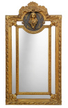 Grand miroir à parcloses de style Louis XVI doré profil feminin