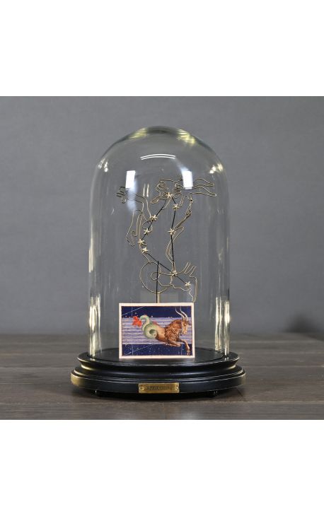 Glass dome at the Zodiac (Capricorn) mounted on wooden base