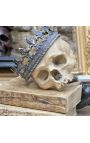 Teschio umano "Memento Mori" presentato su base di legno