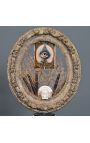 Oval frame "Memento Mori in the third eye" presented on wooden base