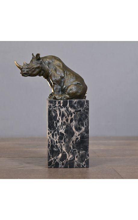 Sculpture en bronze de rhinocéros sur socle en marbre noir