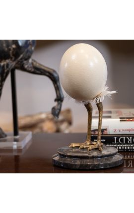 Decorative object composed of an ostrich egg on black marble base