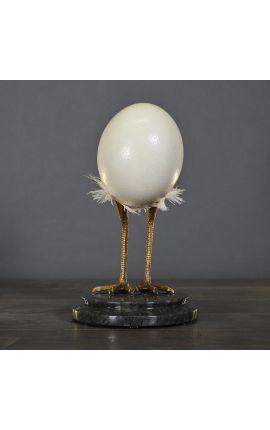 Decorative object composed of an ostrich egg on black marble base