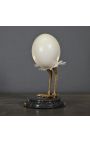 Decorative object composed of an ostrich egg on black marble base