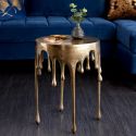 Side table "MELTED" of aluminium golden color